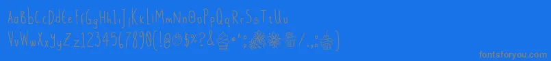 DaisysDelights Font – Gray Fonts on Blue Background