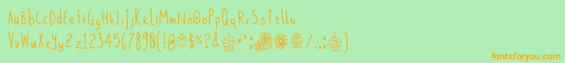 DaisysDelights Font – Orange Fonts on Green Background