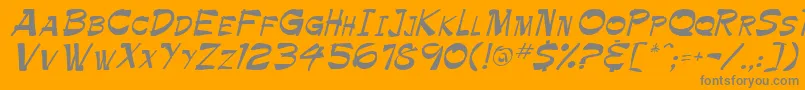 TrinnetteRegular-Schriftart – Graue Schriften auf orangefarbenem Hintergrund