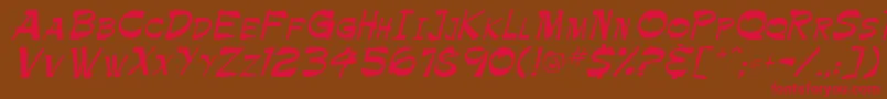 TrinnetteRegular Font – Red Fonts on Brown Background