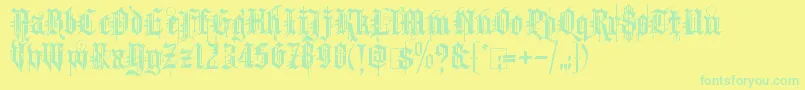 KingthingsSpike-Schriftart – Grüne Schriften auf gelbem Hintergrund
