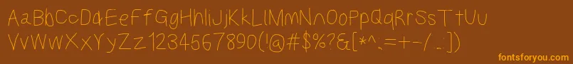 Kabinasebd Font – Orange Fonts on Brown Background