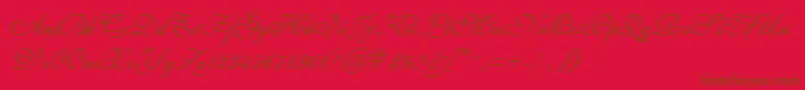 Fonte GeSheerScript – fontes marrons em um fundo vermelho