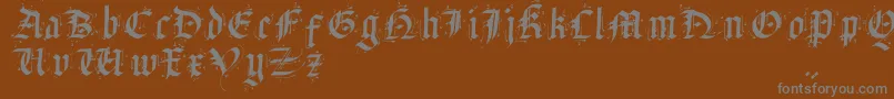 フォントSatanHumSav – 茶色の背景に灰色の文字