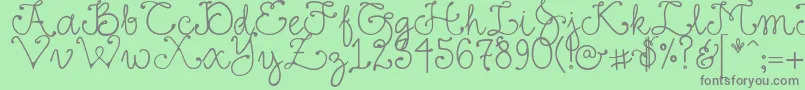 DjFancy Font – Gray Fonts on Green Background