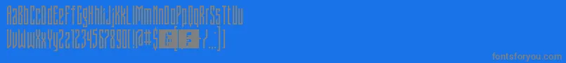 FontstructivismRegular-fontti – harmaat kirjasimet sinisellä taustalla