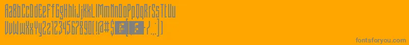 フォントFontstructivismRegular – オレンジの背景に灰色の文字