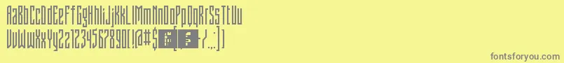Czcionka FontstructivismRegular – szare czcionki na żółtym tle