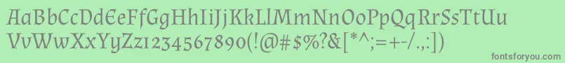 AlmendraRegular-Schriftart – Graue Schriften auf grünem Hintergrund