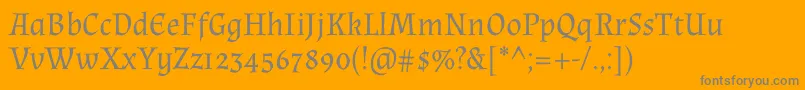 AlmendraRegular-Schriftart – Graue Schriften auf orangefarbenem Hintergrund