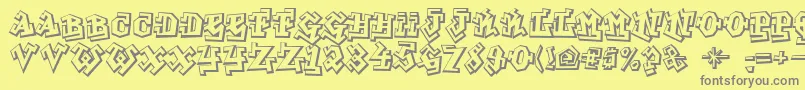 フォントGraffitiTreat – 黄色の背景に灰色の文字