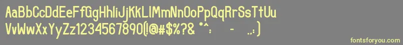 UncertainSans Font – Yellow Fonts on Gray Background