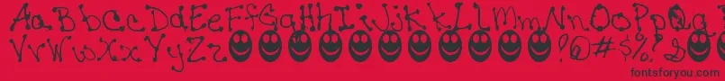 フォントJaninesWriting – 赤い背景に黒い文字