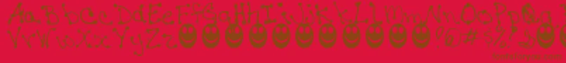 JaninesWriting Font – Brown Fonts on Red Background