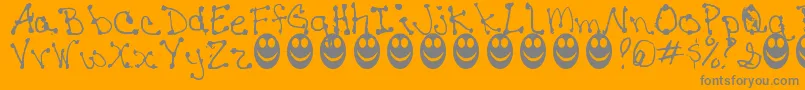 fuente JaninesWriting – Fuentes Grises Sobre Fondo Naranja