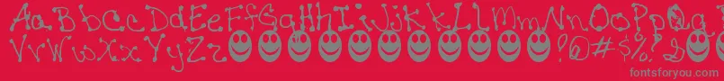 JaninesWriting Font – Gray Fonts on Red Background