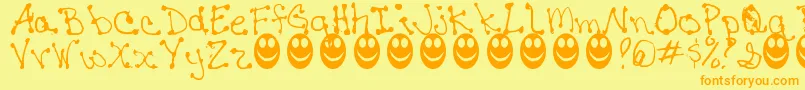 JaninesWriting Font – Orange Fonts on Yellow Background