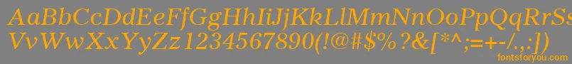 フォントGazetteLtItalic – オレンジの文字は灰色の背景にあります。