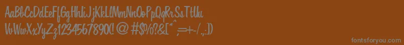 フォントHousedbNormal – 茶色の背景に灰色の文字