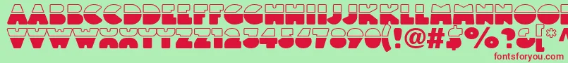 Czcionka Linotypeblackwhite – czerwone czcionki na zielonym tle