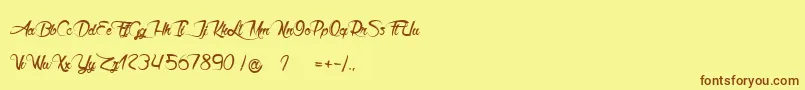fuente Akhenaton – Fuentes Marrones Sobre Fondo Amarillo