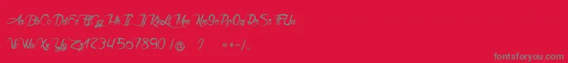 Akhenaton Font – Gray Fonts on Red Background