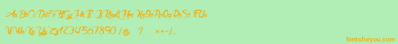 Akhenaton Font – Orange Fonts on Green Background