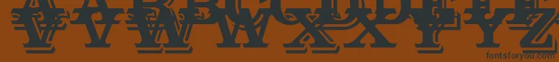 Outstanding-Schriftart – Schwarze Schriften auf braunem Hintergrund
