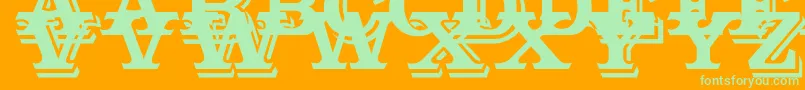 Outstanding Font – Green Fonts on Orange Background