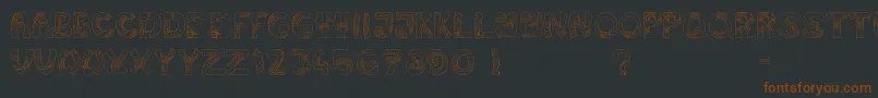 Jump-fontti – ruskeat fontit mustalla taustalla