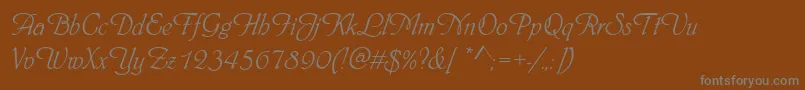 Phyllisd-fontti – harmaat kirjasimet ruskealla taustalla