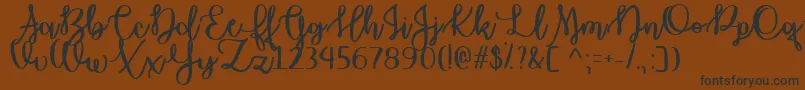 OctoberMoonTtf Font – Black Fonts on Brown Background