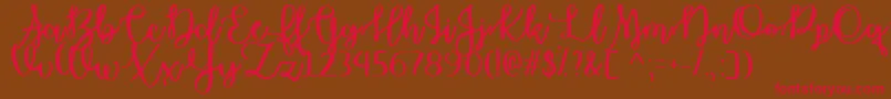 OctoberMoonTtf Font – Red Fonts on Brown Background