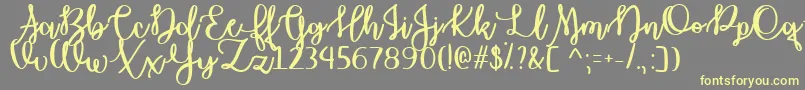 OctoberMoonTtf Font – Yellow Fonts on Gray Background