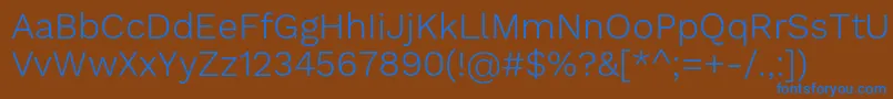 WorksansLight-Schriftart – Blaue Schriften auf braunem Hintergrund