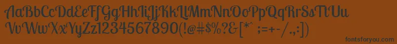 LobstertwoRegular-Schriftart – Schwarze Schriften auf braunem Hintergrund