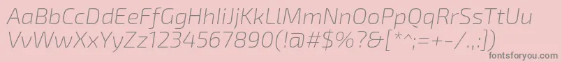 フォントExo2.0Extralightitalic – ピンクの背景に灰色の文字