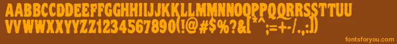 Vtcnightofthedrippydeadcaps-Schriftart – Orangefarbene Schriften auf braunem Hintergrund