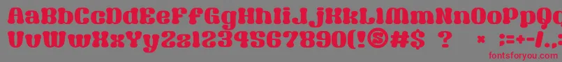 フォントGomariceSyouwaRetroPop – 赤い文字の灰色の背景