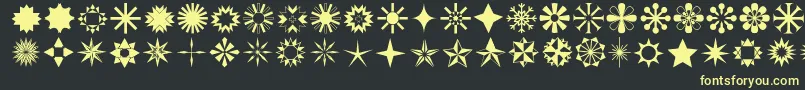 フォントStars1o – 黒い背景に黄色の文字
