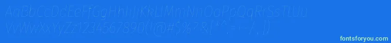 FirasanscondensedFouritalic-Schriftart – Grüne Schriften auf blauem Hintergrund