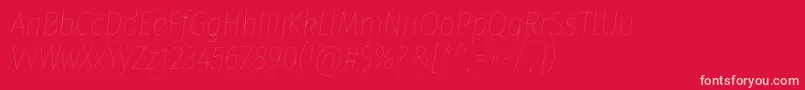 Czcionka FirasanscondensedFouritalic – różowe czcionki na czerwonym tle