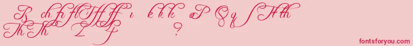 FreebooterScriptAlts-Schriftart – Rote Schriften auf rosa Hintergrund