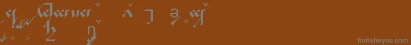 TengwarNoldorA-Schriftart – Graue Schriften auf braunem Hintergrund