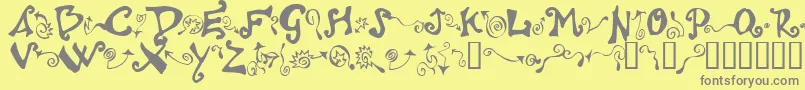 フォントPolywog ffy – 黄色の背景に灰色の文字