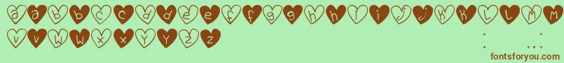 LoveYouTfb Font – Brown Fonts on Green Background