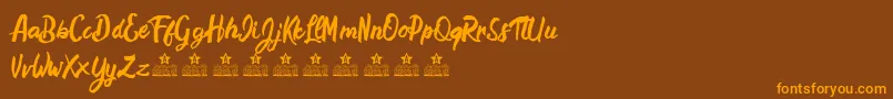 HamstersPersonalUse Font – Orange Fonts on Brown Background