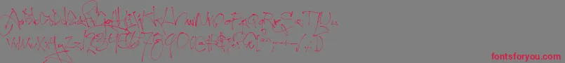フォントFirstlyrics – 赤い文字の灰色の背景