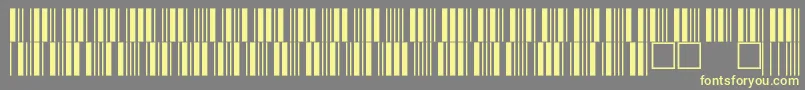 C39p12dmtt-fontti – keltaiset fontit harmaalla taustalla