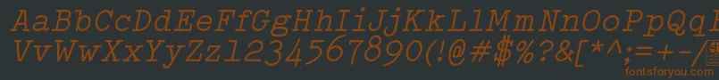 Шрифт TypowriterItalicDemo – коричневые шрифты на чёрном фоне